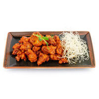 Piquant chicken with chili garlic sauce with ginger