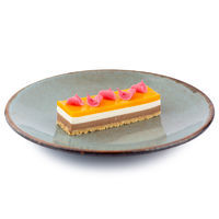 Light mango dessert with almond praline